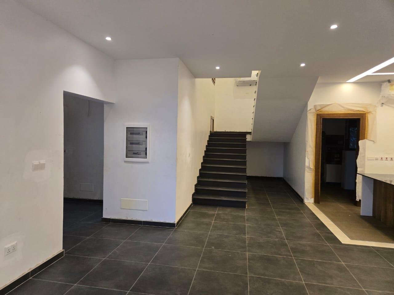 Executive four-bedroom house located in the prestigious West Legon area.